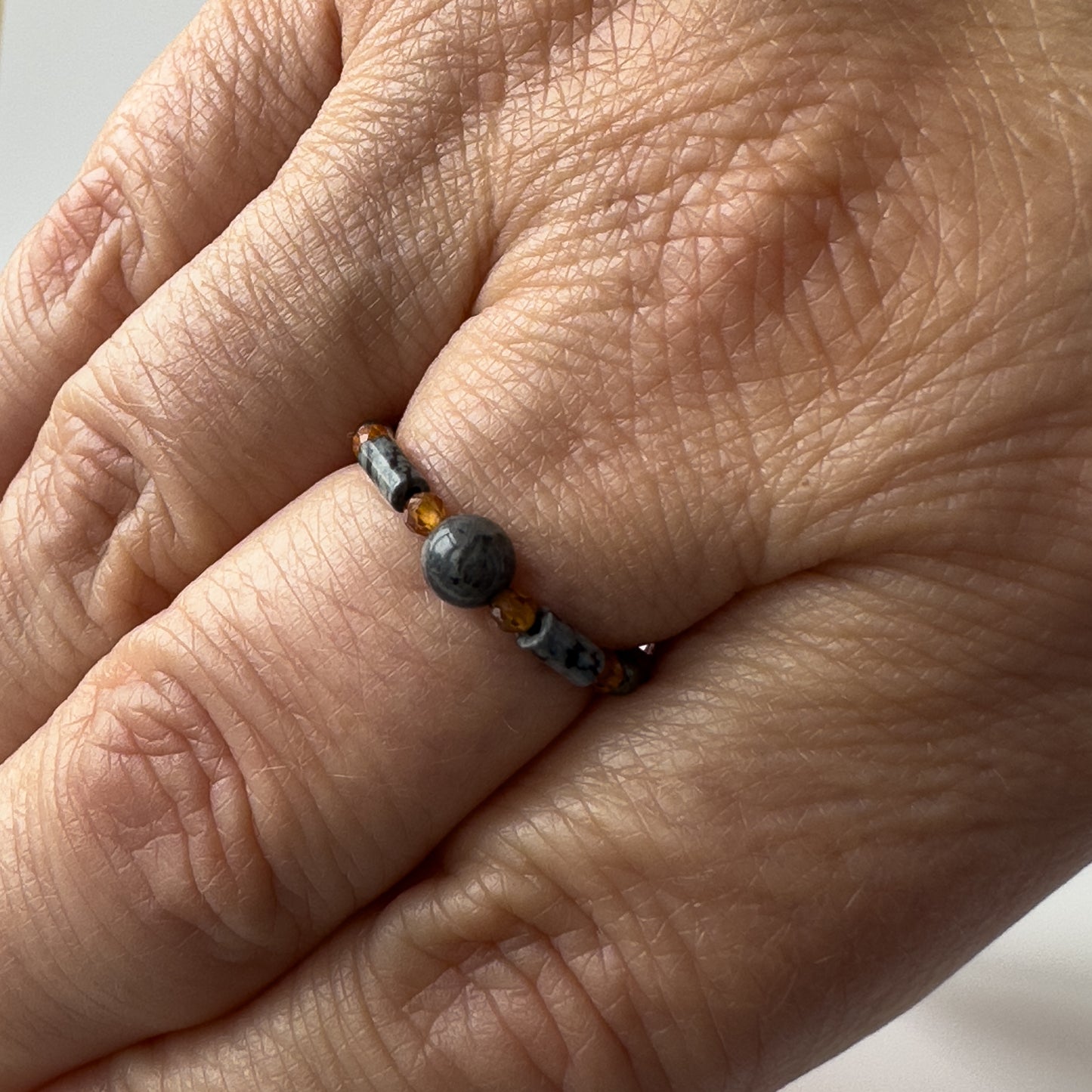 Scorpio Birthstone Healing Crystal ring for Strength and Courage on finger