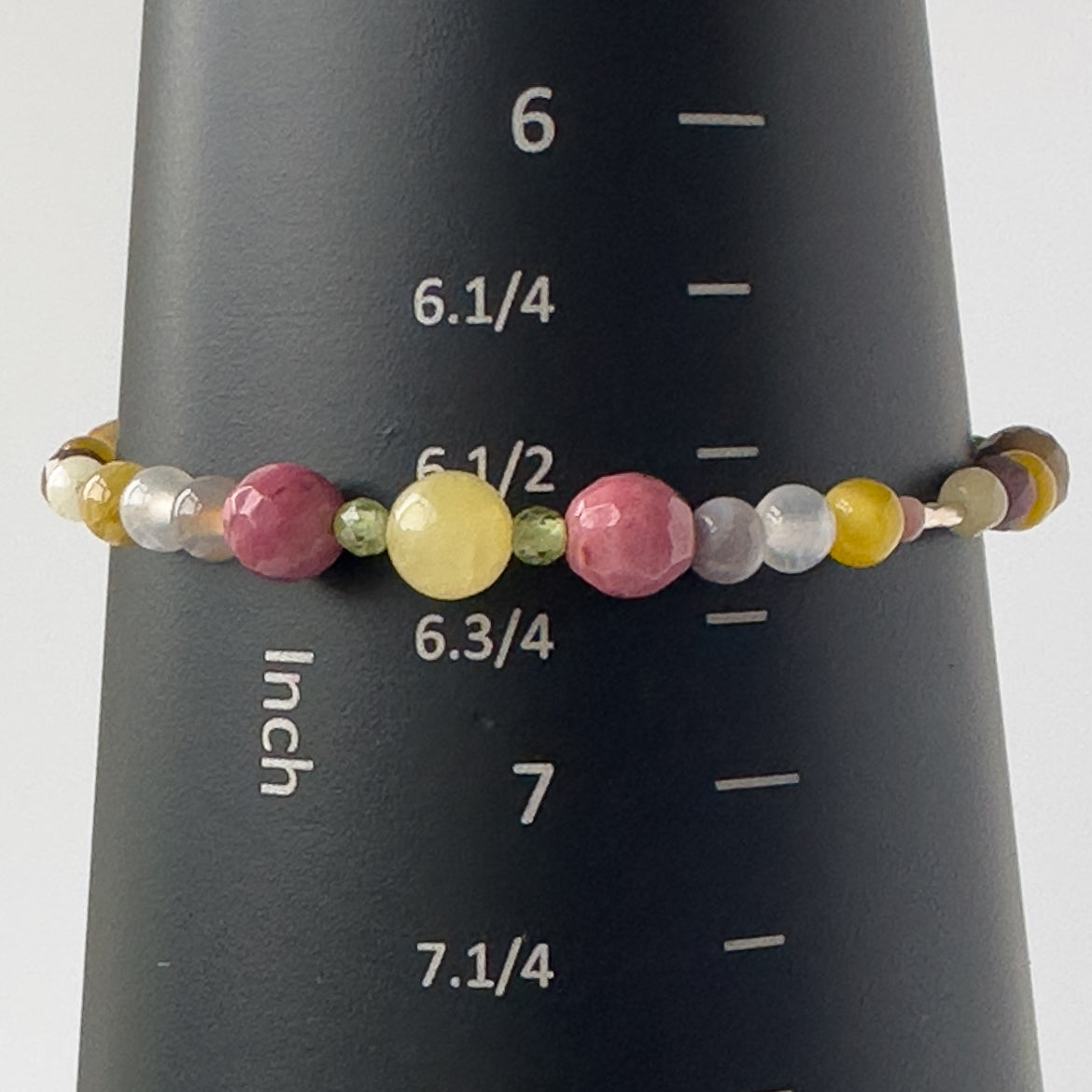 Taurus Birthstone Healing Crystal bracelet for Confidence and Self-esteem on mandrel showing a size of 6.5 inches
