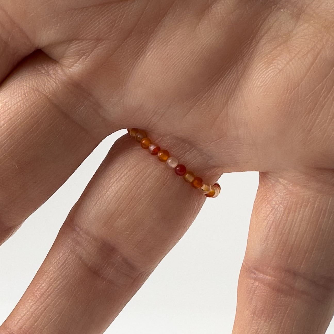 Underside of Libra Birthstone Healing Crystal ring for Strength and Courage on finger