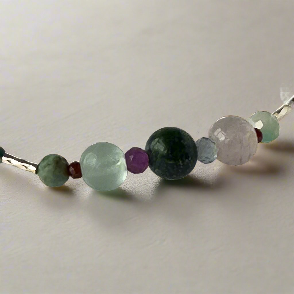 Virgo birthstone Healing Crystal bracelet for Confidence and Self-esteem showing Chrysocolla, Fluorite, Purple Fluorite and Garnet