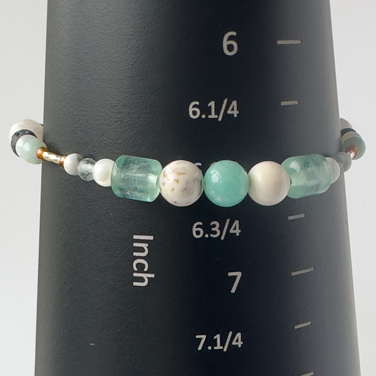 Virgo birthstone Healing Crystal bracelet for Calm & Stress relief on mandrel showing size as 6.5 inches
