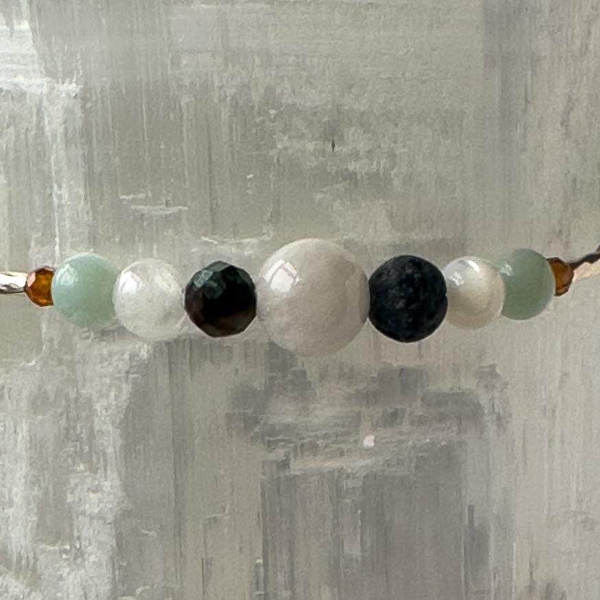 Virgo birthstone Healing Crystal bracelet for Calm & Stress relief showing Moonstone, Amazonite, Garnet, Chrysocolla and Lava Stone