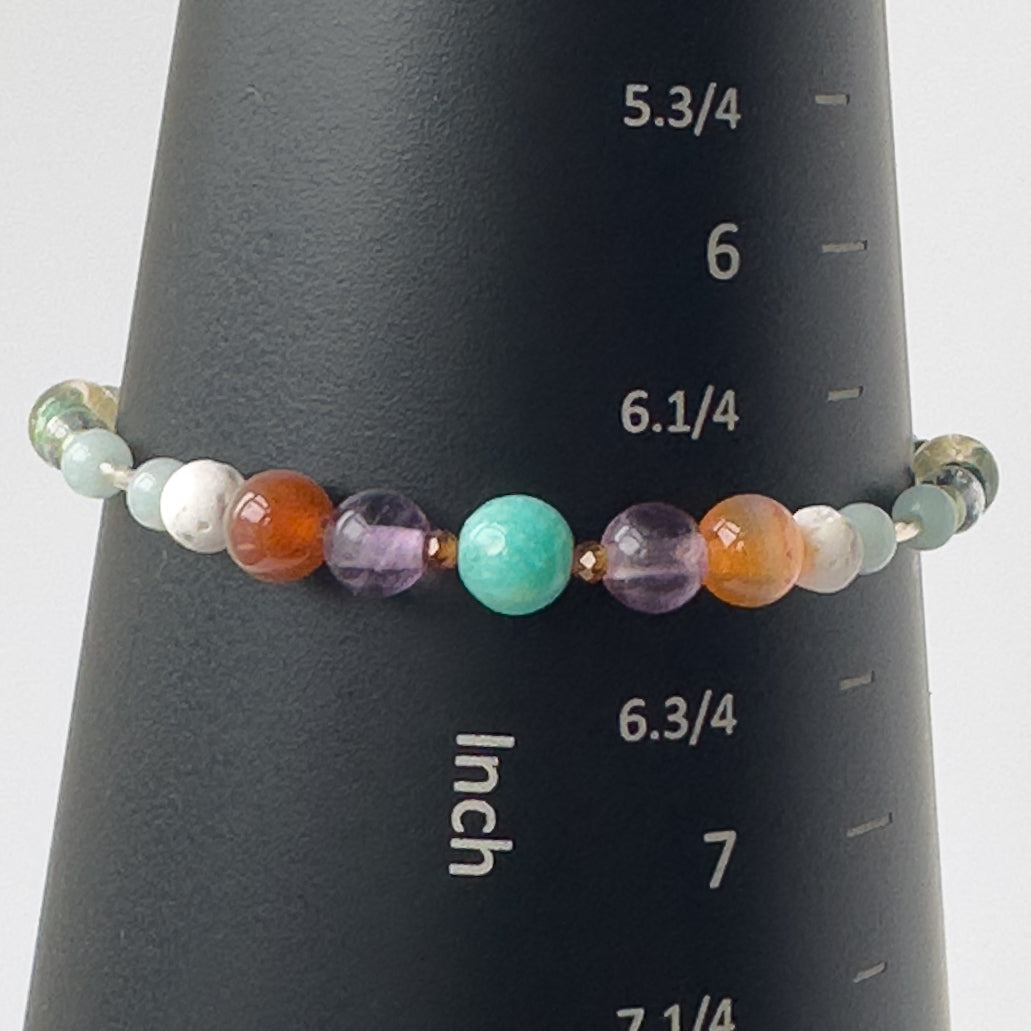 Virgo Birthstone Healing Crystal bracelet for Determination & Willpower on mandrel showing size as 6.5 inches