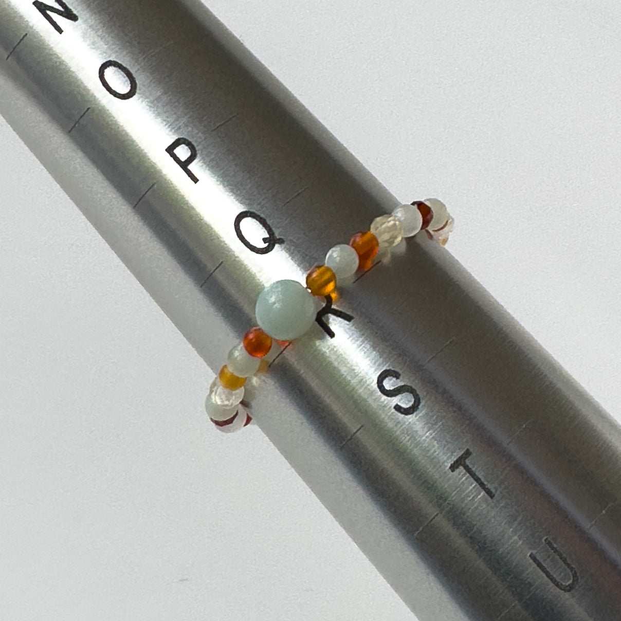 Virgo Birthstone Healing Crystal ring for Strength and Courage on mandrel showing size of R