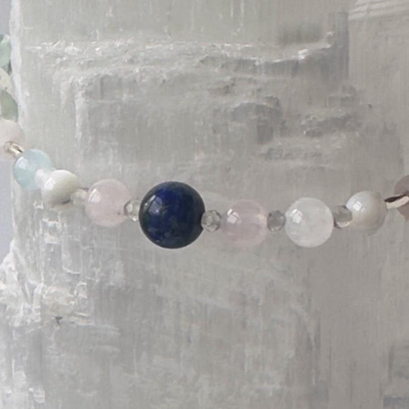 Aquarius Healing Crystal bracelet for Anxiety Close up showing Aquamarine, Fluorite, Moonstone, Azurite and Rose Quartz