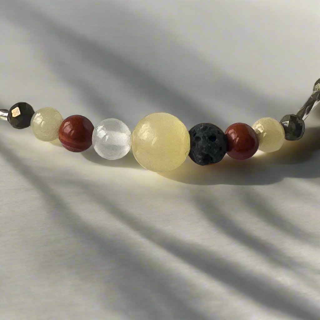 Aries Birthstone Healing Crystal bracelet for Confidence and Self-esteem showing Iron Pyrite, Jasper, Aragonite & Lava Stone