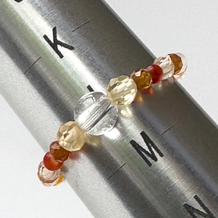 Aries Birthstone Healing Crystal ring for Strength and Courage On mandrel showing ring size of L