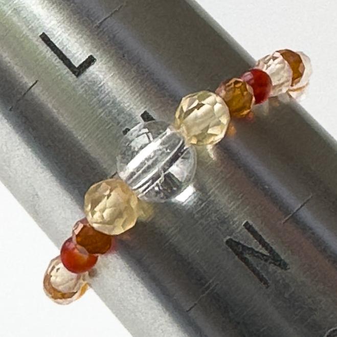 Aries Birthstone Healing Crystal ring for Strength and Courage on mandrel showing size as M