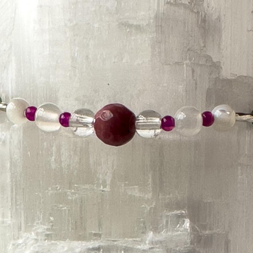 Cancer Birthstone Healing Crystal bracelet for Grief & Loss support showing Moonstone, Ruby, Rhodonite, Selenite and Clear Quartz