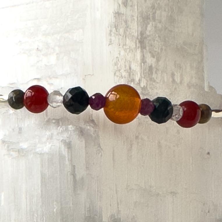 Cancer Birthstone Healing Crystal bracelet for Determination & Willpower showing Ruby, Carnelian, Chrysocolla, Rose Quartz, Leopardskin Jasper and Clear Quartz