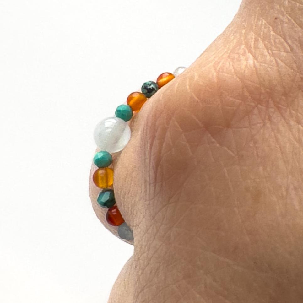 Cancer Birthstone Healing Crystal ring for Strength and Courage Profile view on a finger