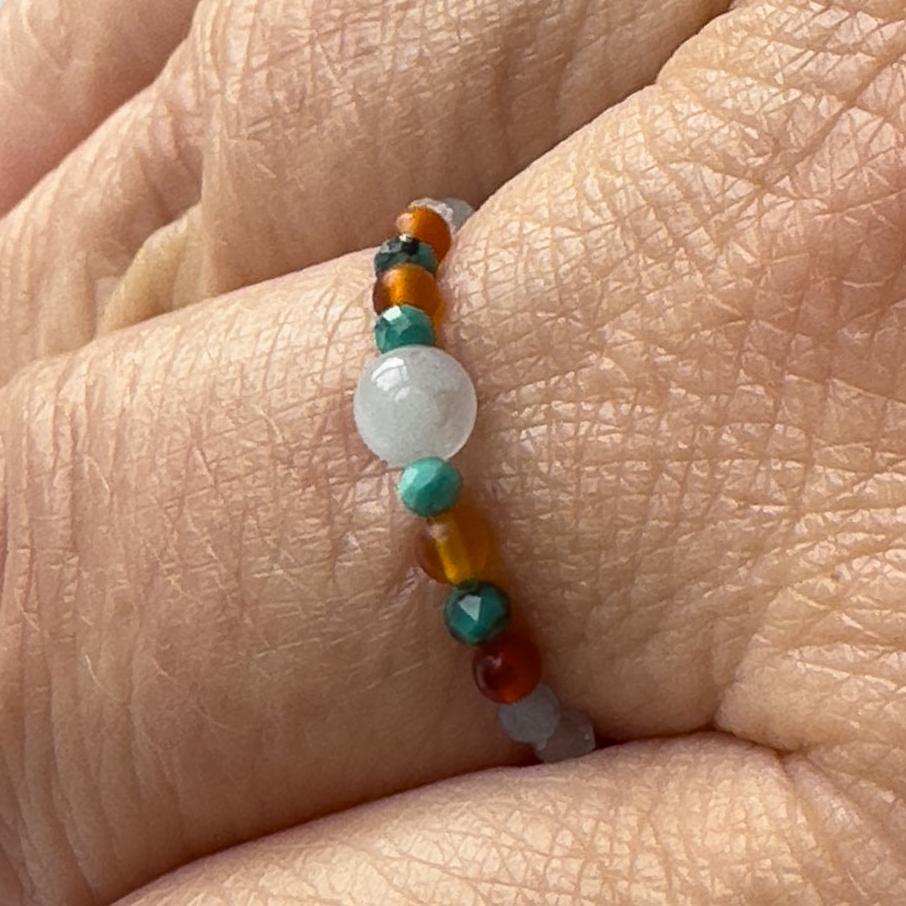 Cancer birthstone Healing Crystal ring for Strength and Courage on a finger