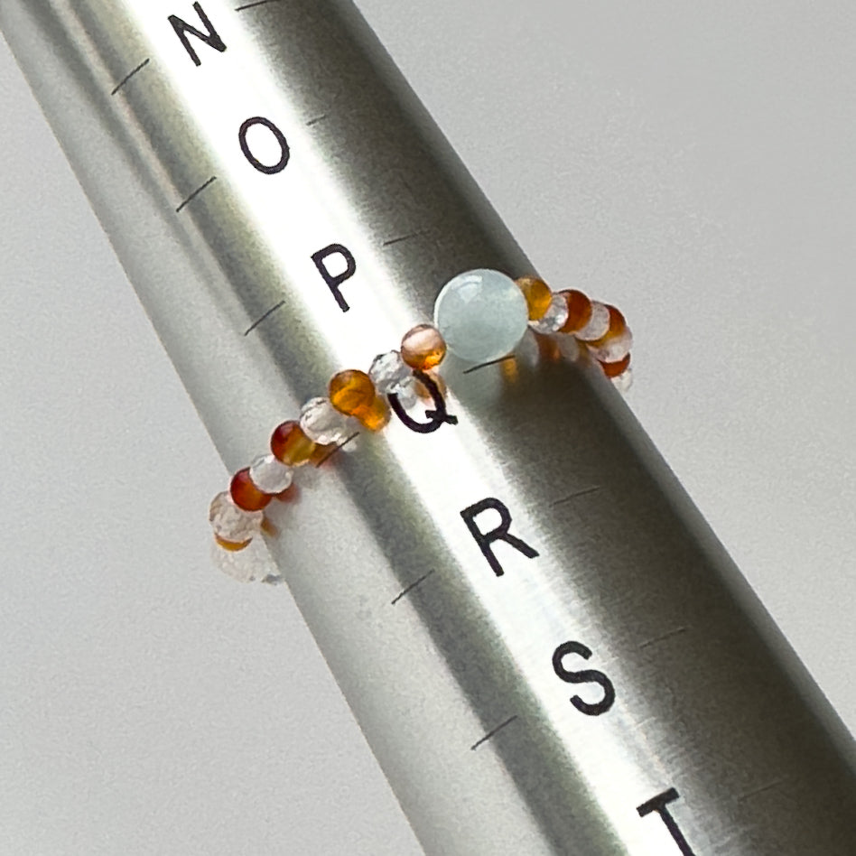 Courage Birthstone Healing Crystal ring for Taurus or Aries on mandrel showing size of Q