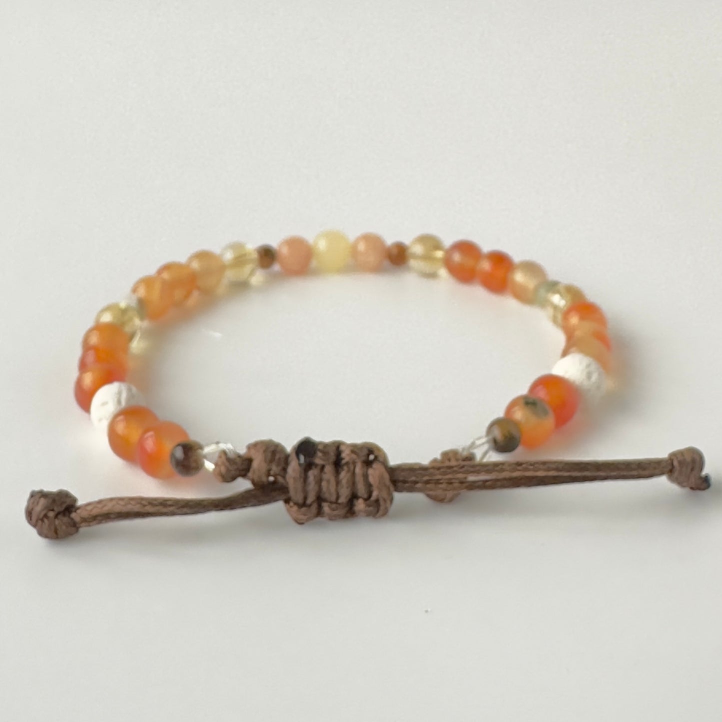 Unisex Healing Crystal Sacral Chakra bracelet with aromatherapy beads