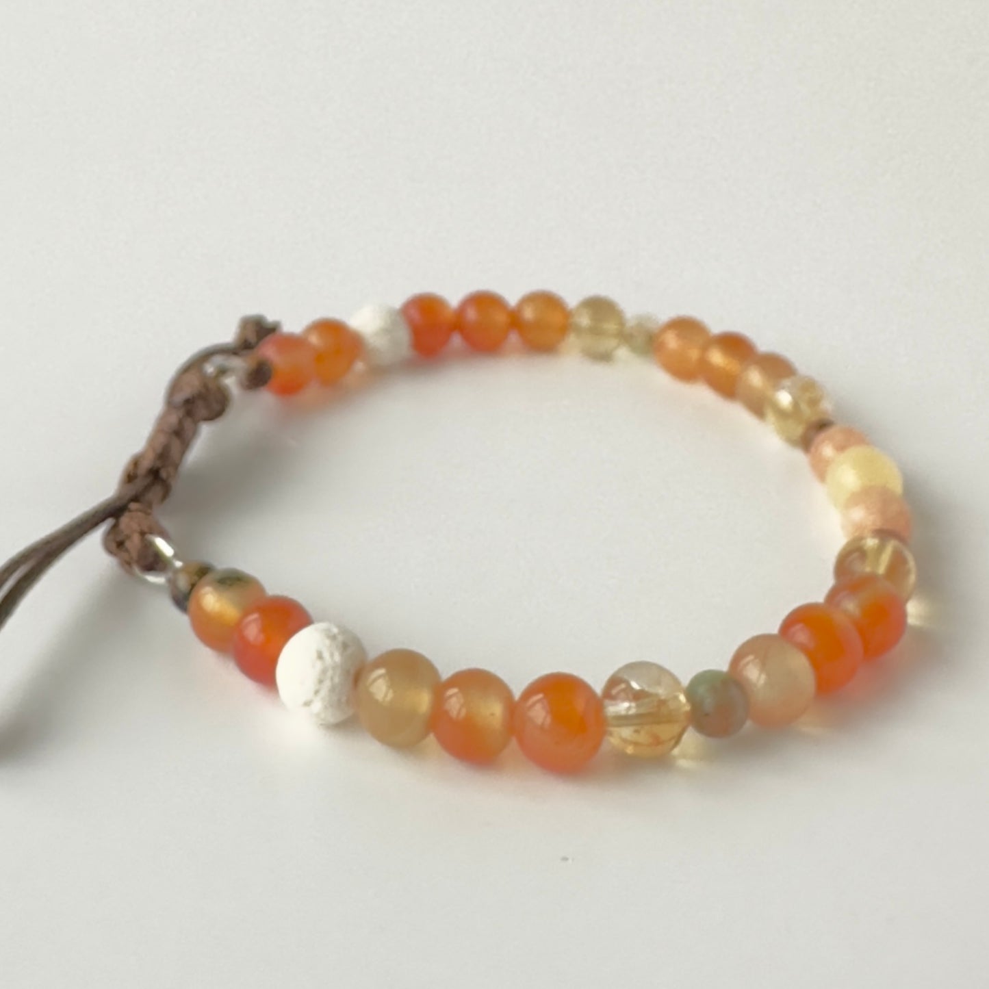 Unisex Healing Crystal Sacral Chakra bracelet with aromatherapy beads
