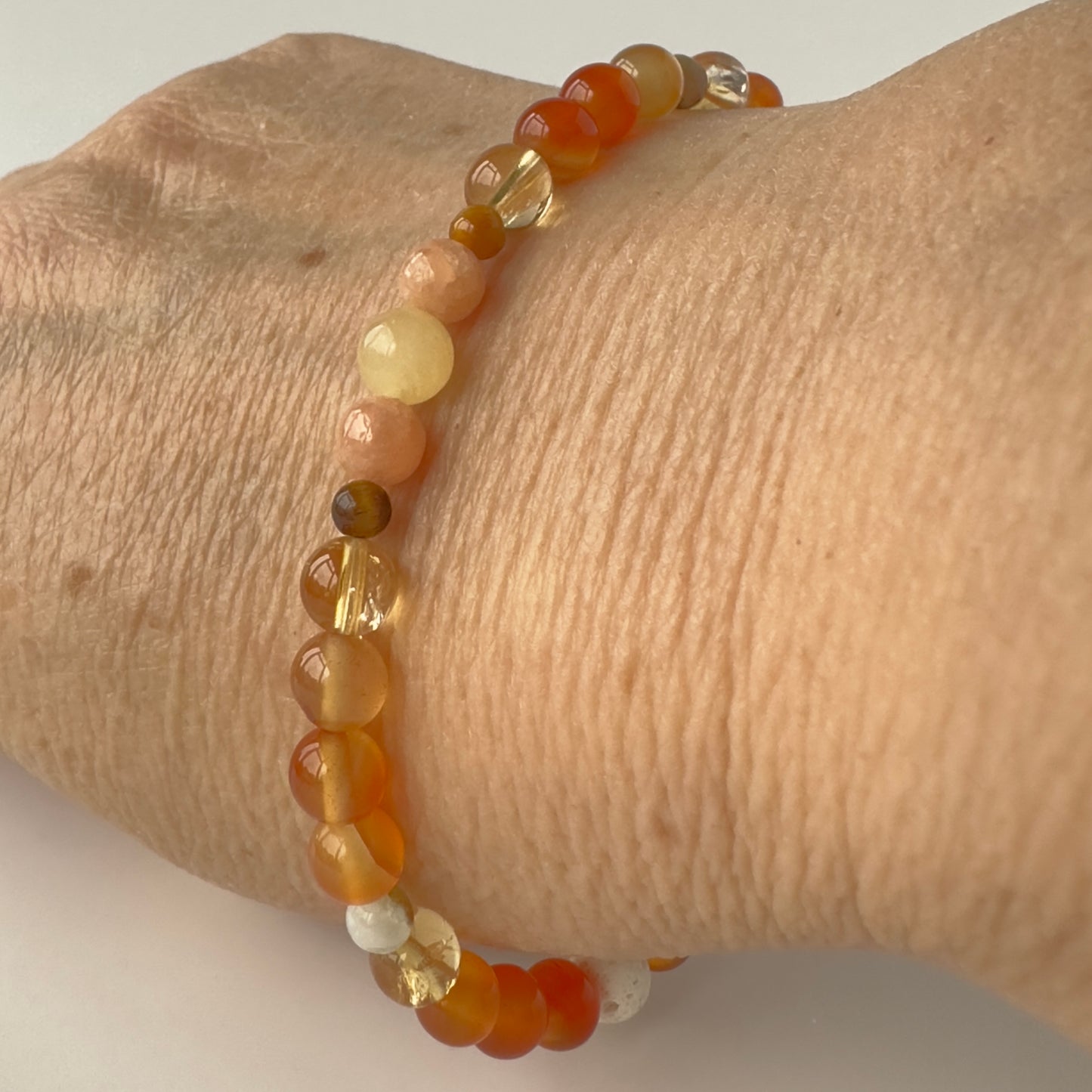 Unisex Healing Crystal Sacral Chakra bracelet with aromatherapy beads