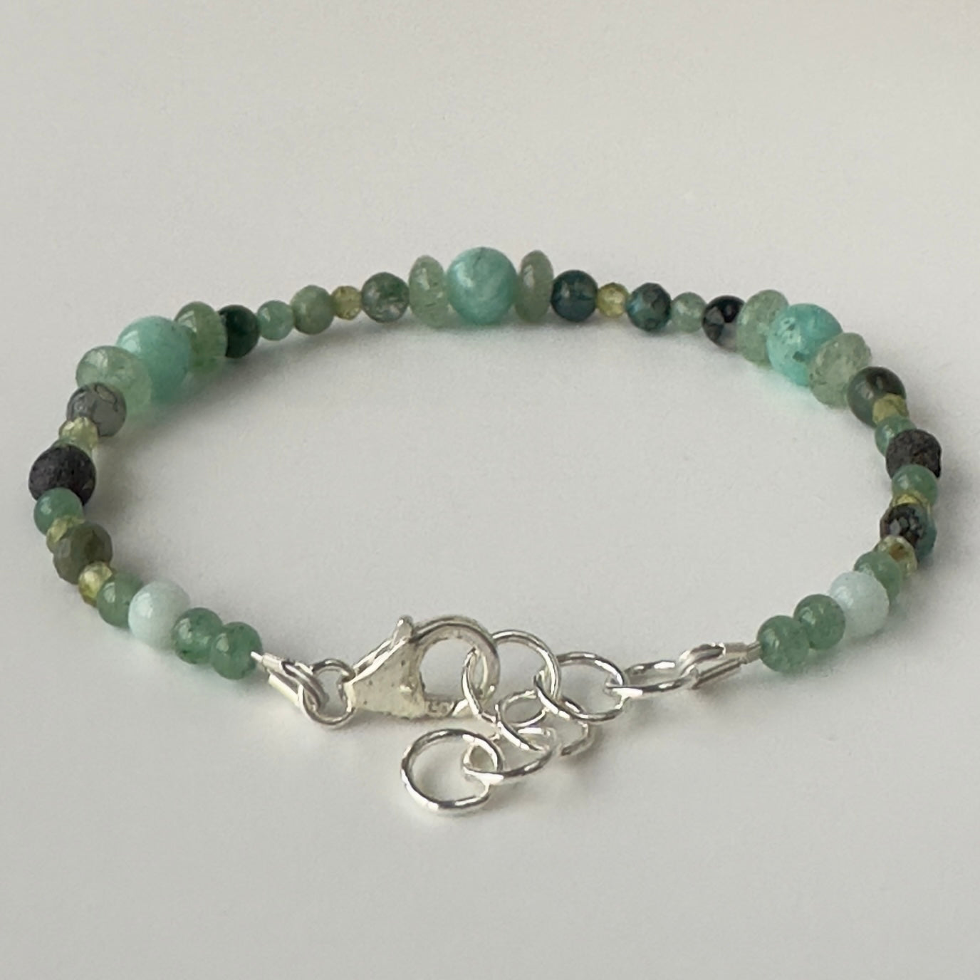 Healing Crystal & Sterling Silver Heart Chakra bracelet with aromatherapy beads