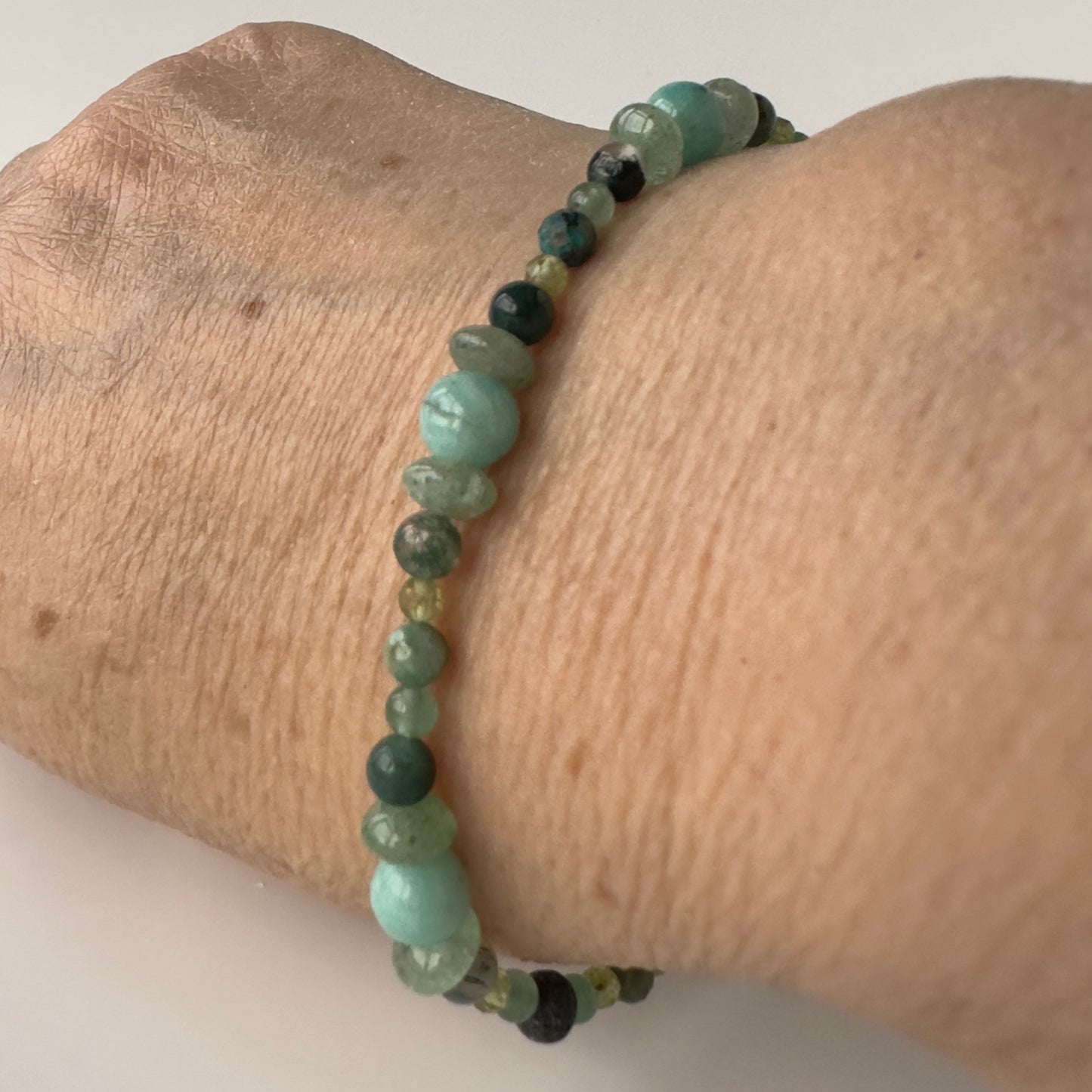 Healing Crystal & Sterling Silver Heart Chakra bracelet with aromatherapy beads