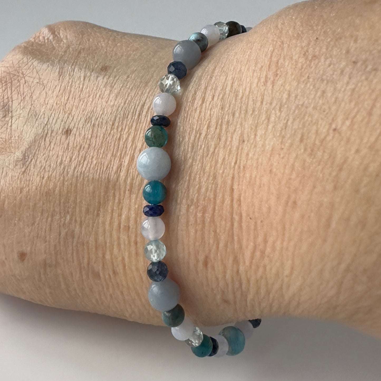 Healing Crystal & Sterling Silver Throat Chakra bracelet with aromatherapy beaads