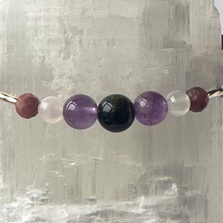 Taurus Healing Crystal bracelet for Anxiety showing Amethyst, Blue Lace Agate, Rhodonite, Kunzite and Blue Tiger’s Eye