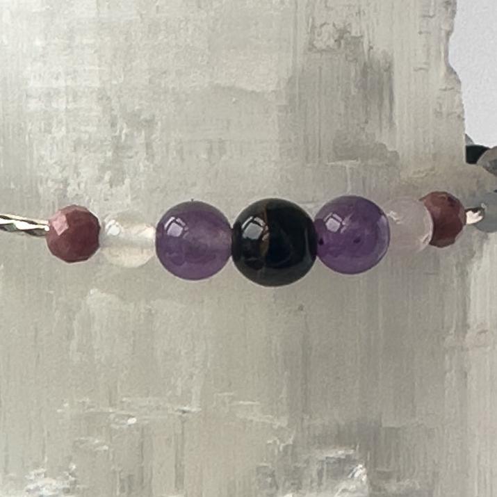 Close-up of Amethyst, Rhodonite and Blue Tiger’s Eye