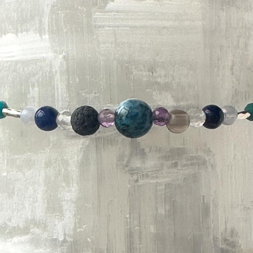 Capricorn Healing Crystal bracelet for Anxiety showing Blue Lace Agate, Smoky Quartz, Amethyst, Azurite, Sodalite, Clear Quartz and Lava Stone