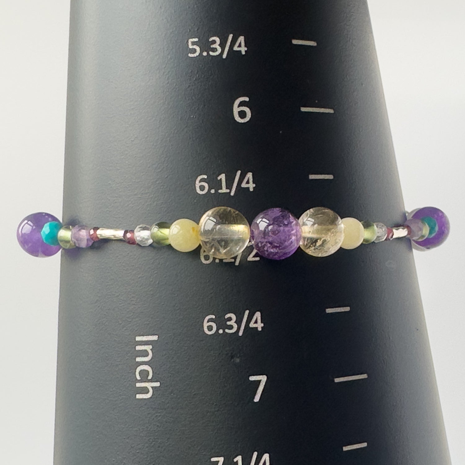 Scorpio Healing Crystal bracelet for Willpower on mandrel showing size as 6.5 inches