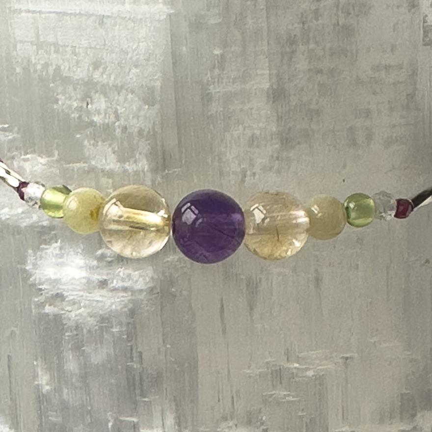 Scorpio Healing Crystal bracelet for Willpower showing Amethyst, Citrine, Aragonite, Garnet, Peridot and Clear Quartz