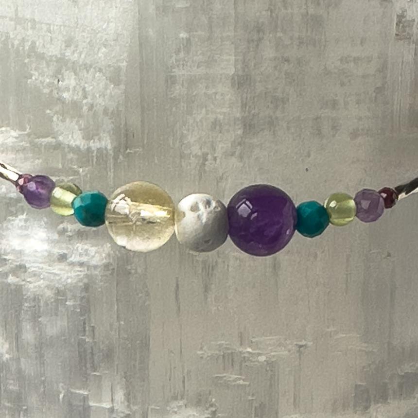 Scorpio Healing Crystal bracelet for Willpower showing Amethyst, Citrine, Turquoise, Peridot and Lava Stone