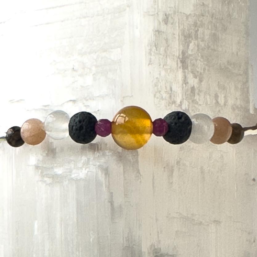 Cancer Healing Crystal bracelet for Willpower showing Carnelian, Ruby, Leopardskin Jasper, Sunstone, Selenite and Lava Stone