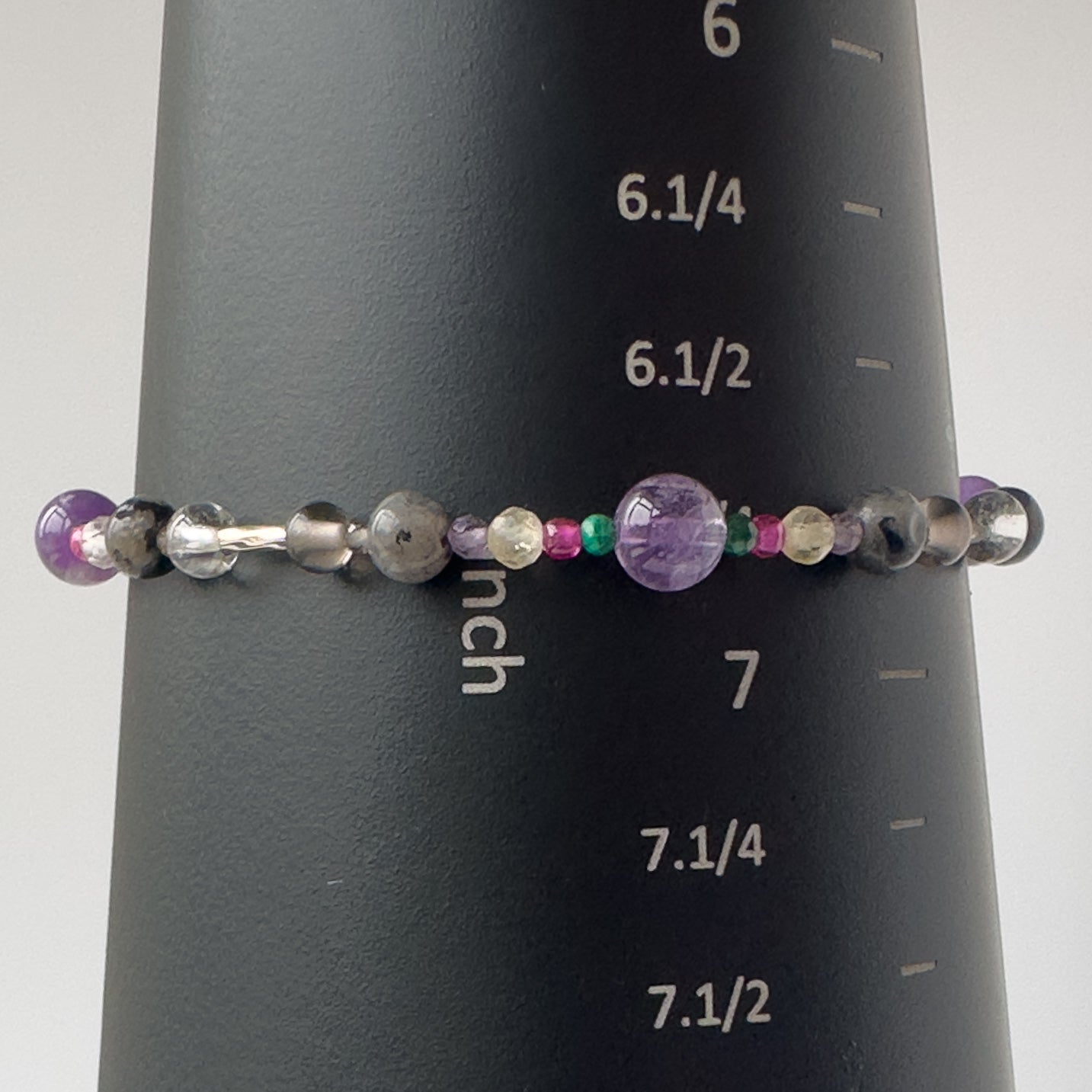 Scorpio Healing Crystal bracelet for Grief & Loss on mandrel showing size of 6.75 inches