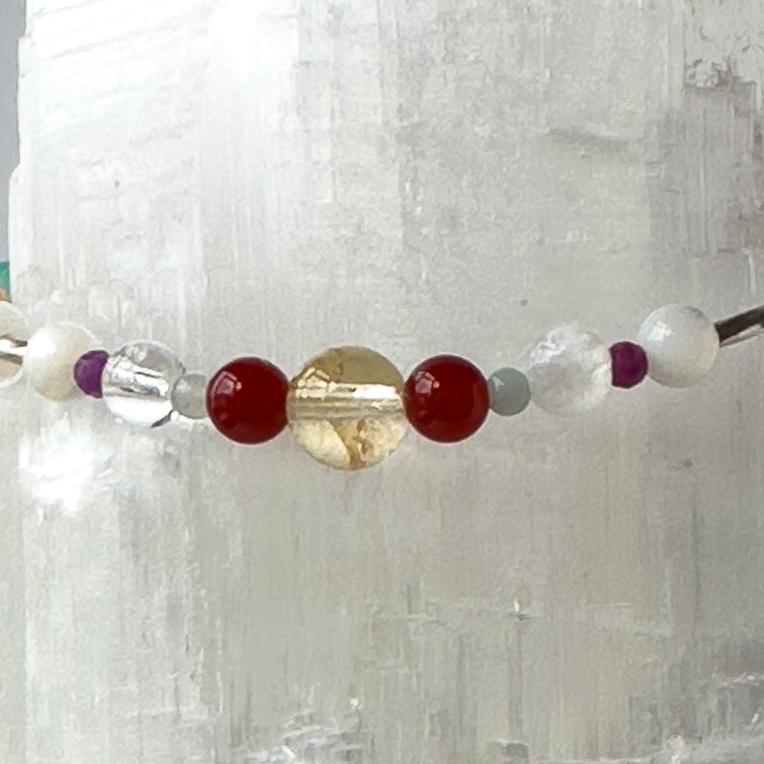 Virgo Healing Crystal bracelet for Grief & Loss showing Carnelian, Amazonite, Citrine, Sugilite, Moonstone, Selenite and Clear Quartz