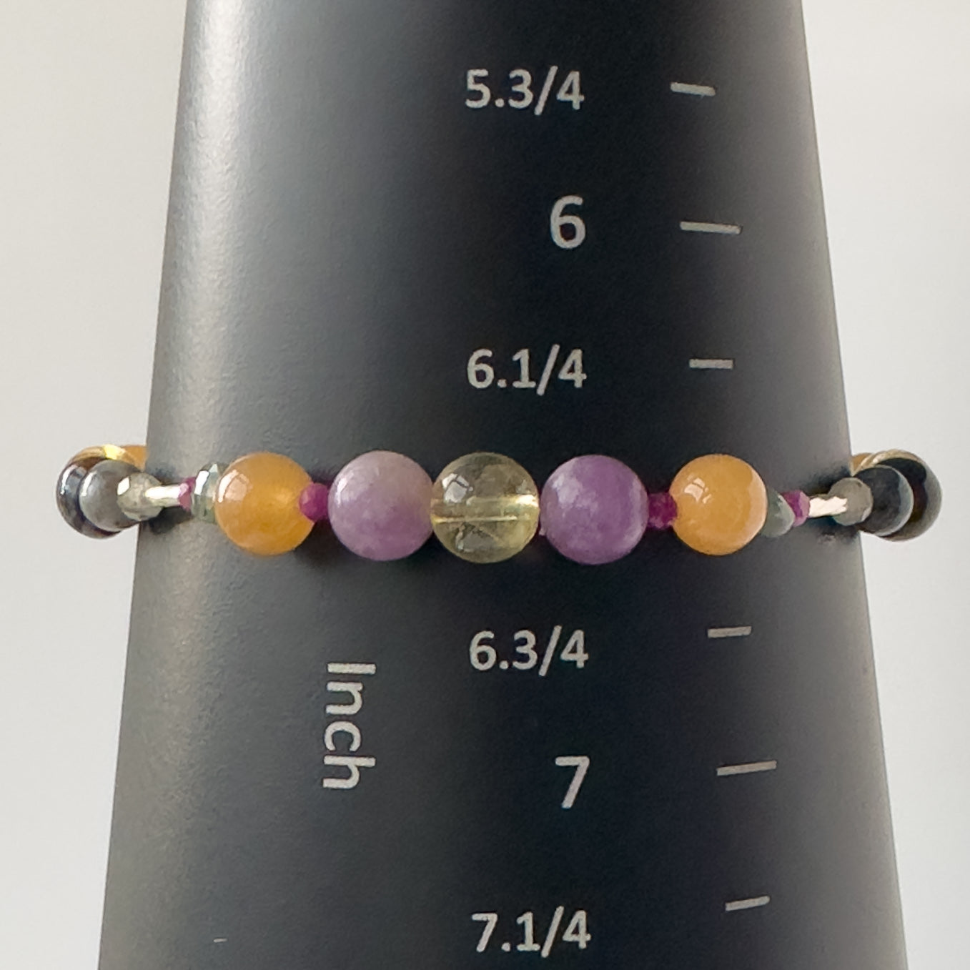 Libra Healing Crystal bracelet for Grief & Loss on mandrel showing size of 6.5 inches