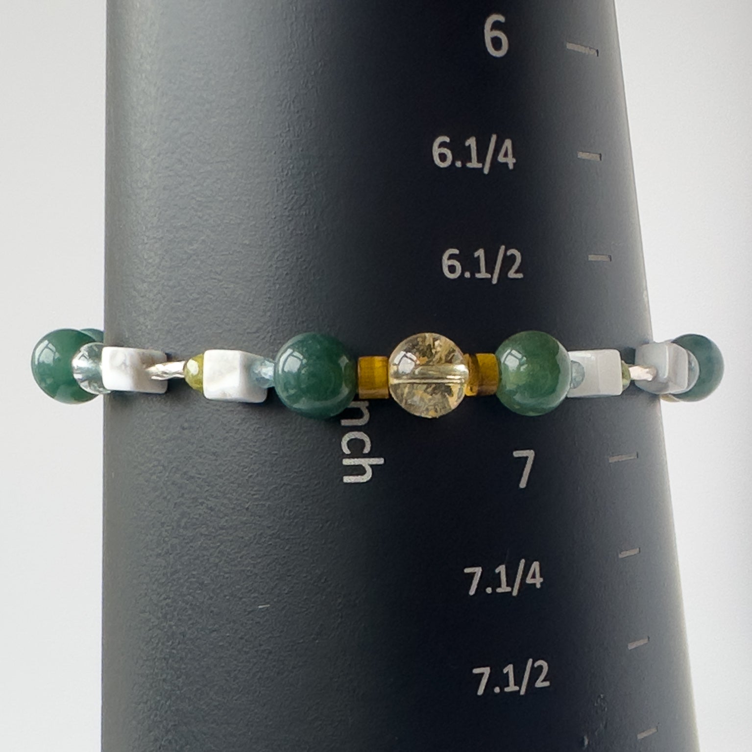 Gemini Healing Crystal bracelet for Love on mandrel showing size of 6.75 inches