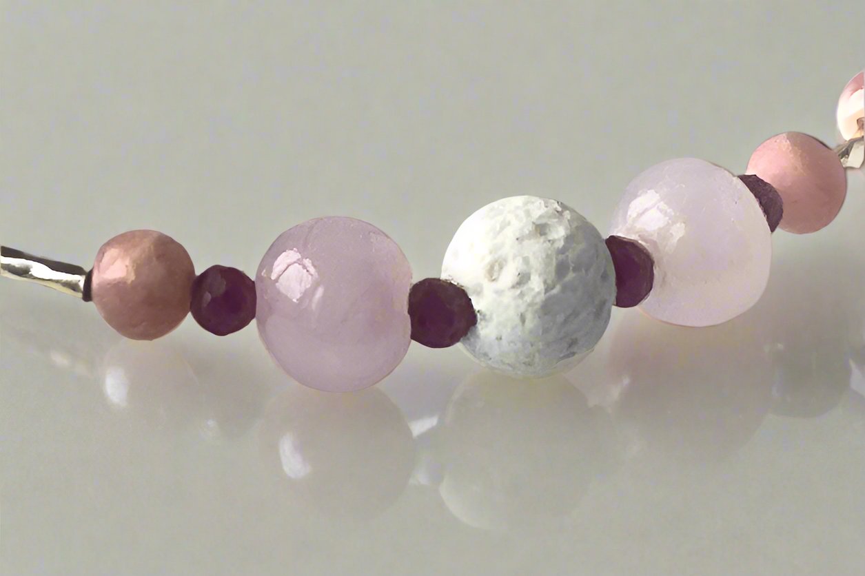 Leo Healing Crystal bracelet for Love showing Rose Quartz, Garnet, Rhodochrosite, Ruby and Lava Stone