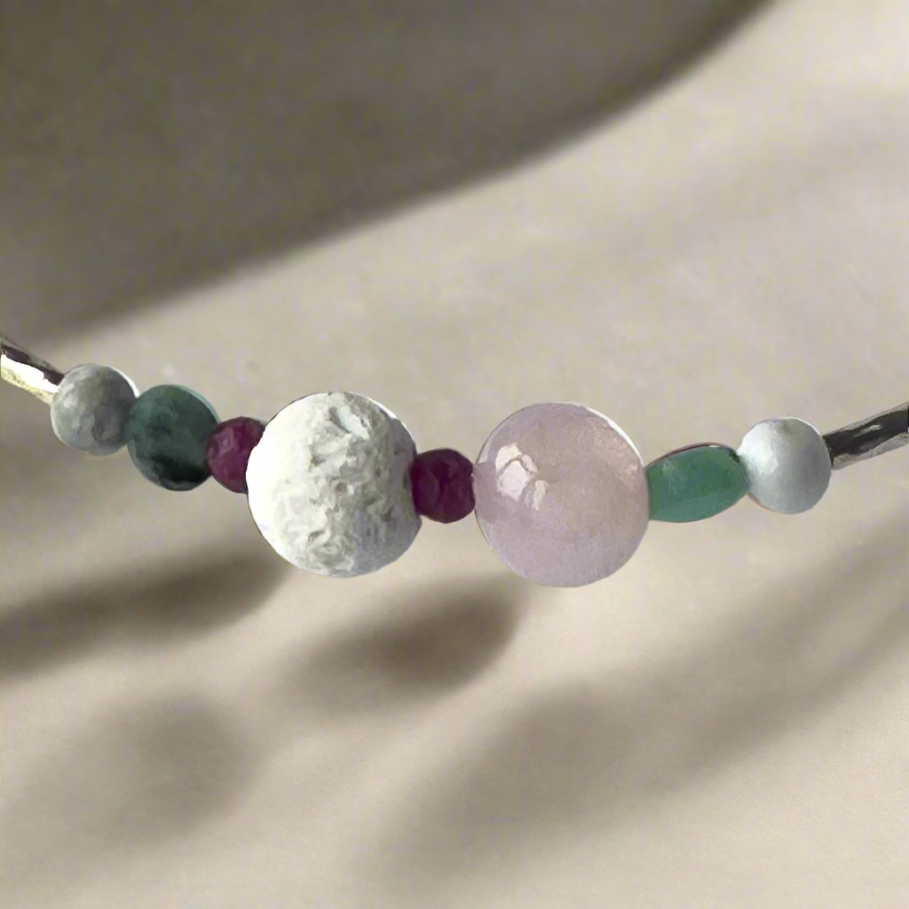 Cancer Healing Crystal bracelet for Love showing Rose Quartz, Emerald, Howlite, Ruby and Lava Stone