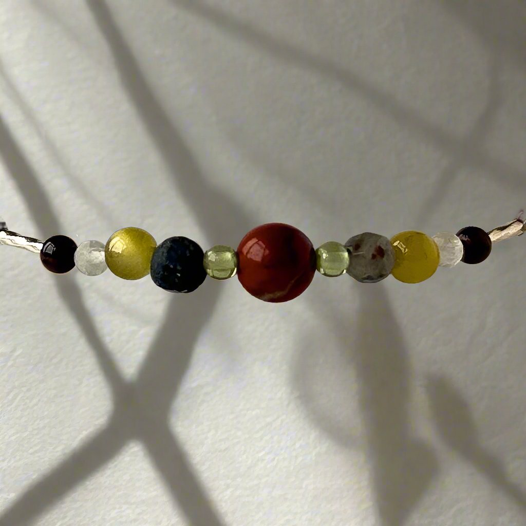 Libra Healing Crystal bracelet for Confidence showing Mahogany Obsidian, Peridot, Lava Stone and Bloodstone