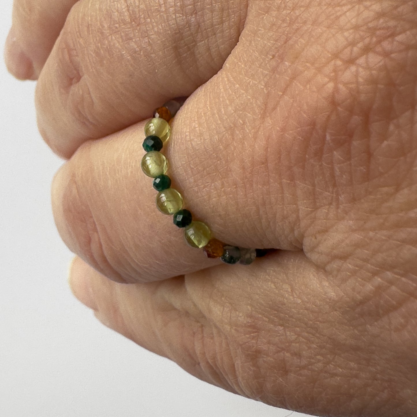 Love Healing Crystal ring for Capricorn or Scorpio on finger