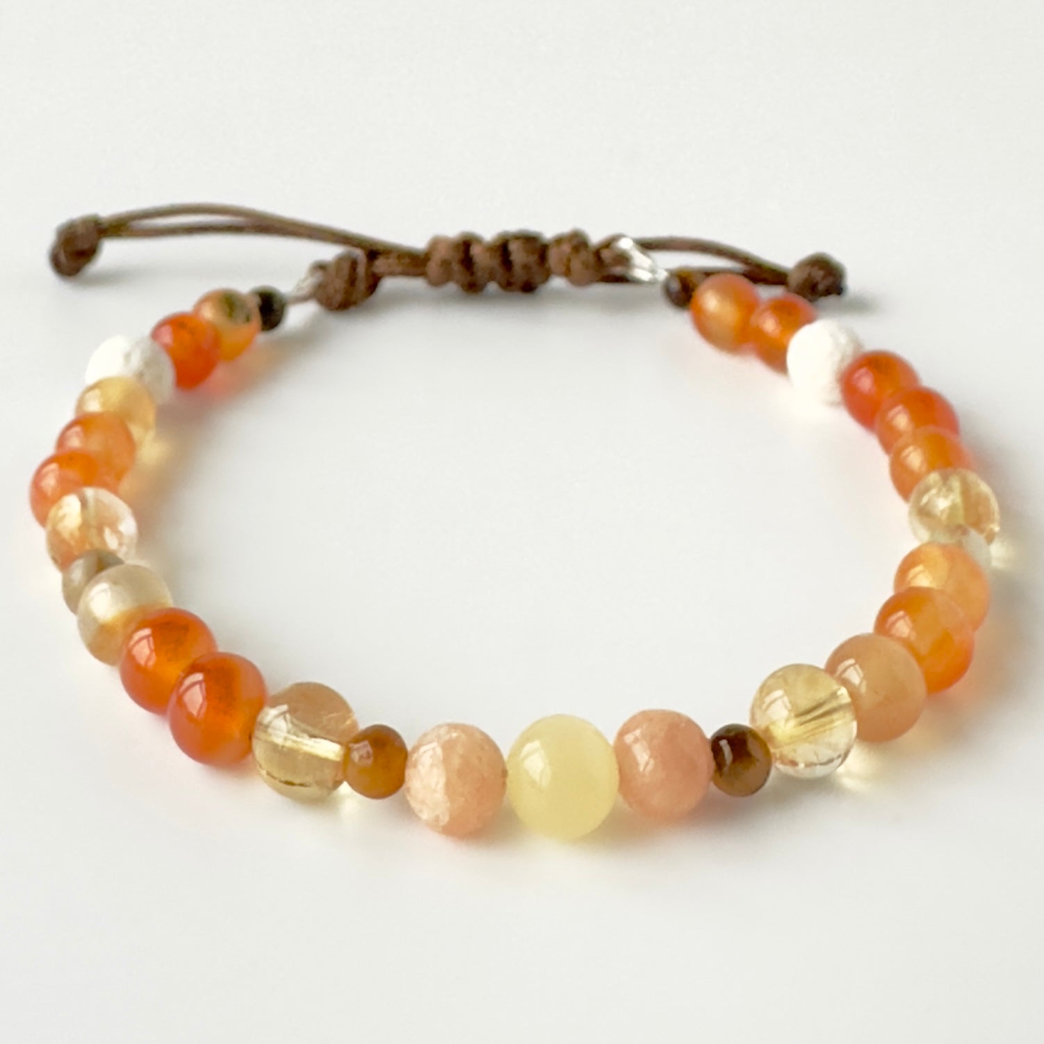 Beaded bracelet with multicolored beads on a white background