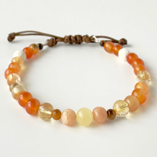 Beaded bracelet with multicolored beads on a white background