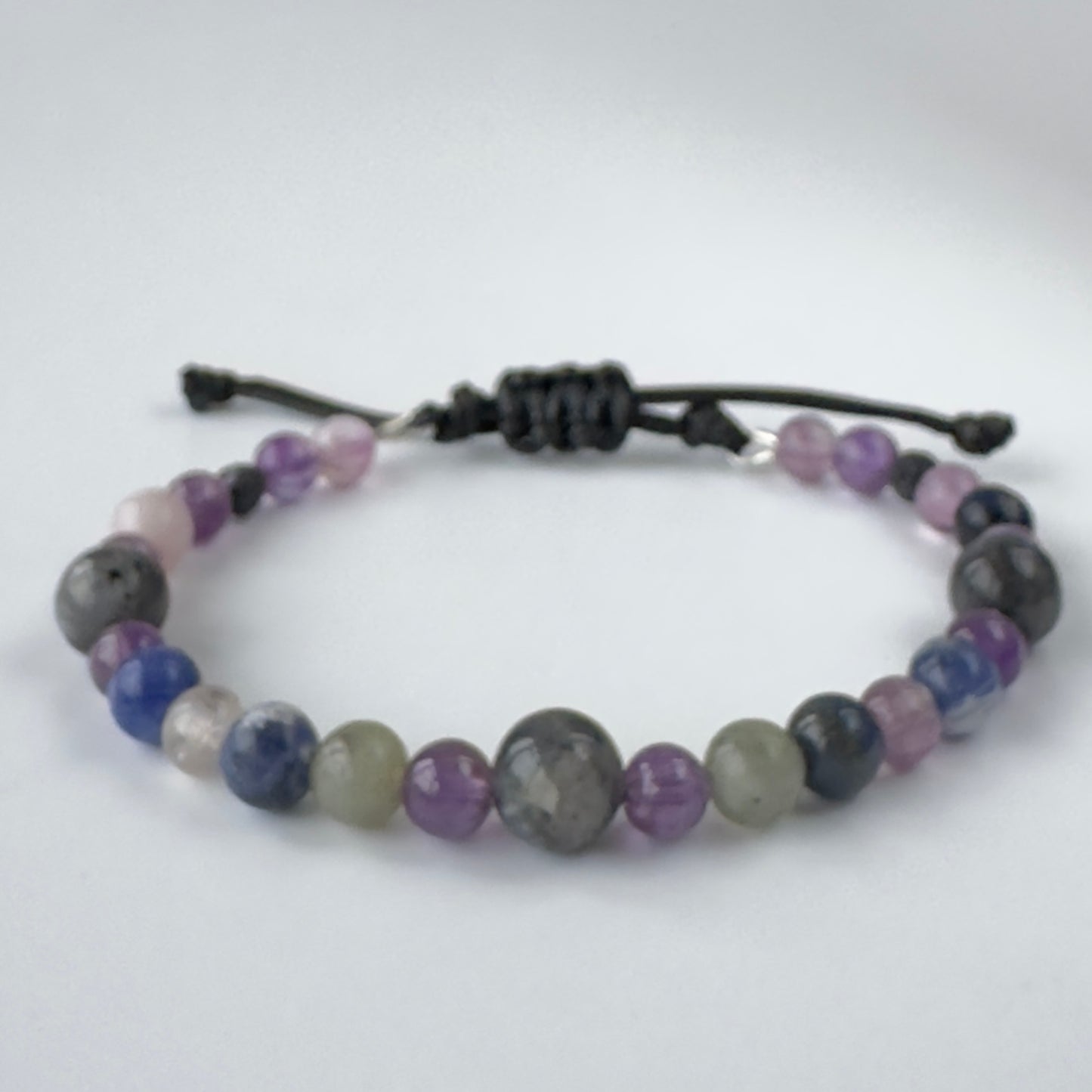 Multicolored beaded bracelet on a white background