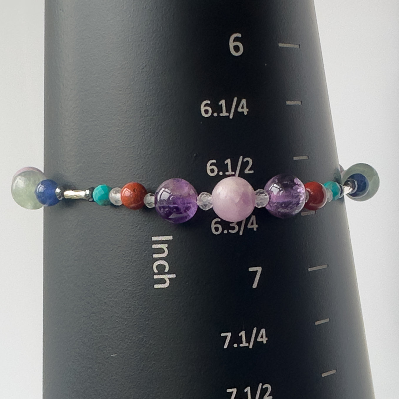 Pisces Birthstone Healing Crystal bracelet for Determination & Willpower on mandrel showing size as approx 6.5-6.75 inches