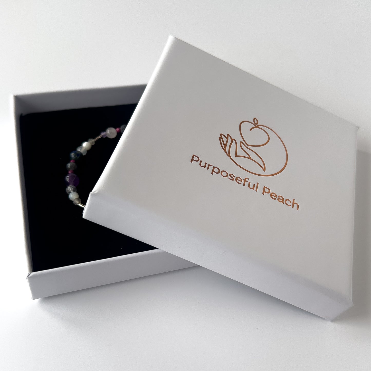 Aquarius Healing Crystal bracelet for Grief & Loss in branded Purposeful Peach box