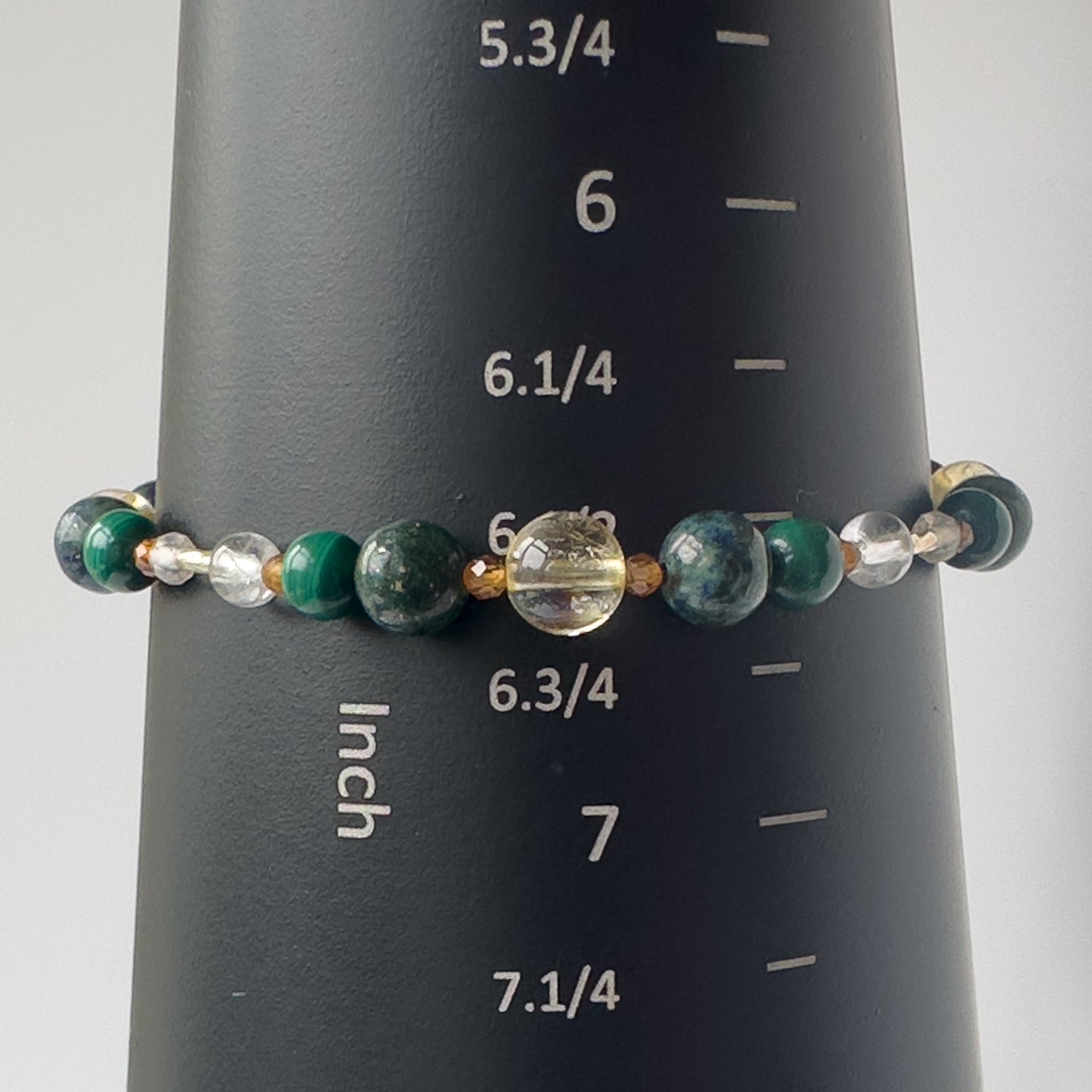 Sagittarius Birthstone Healing Crystal bracelet for Love and Compassion on mandrel showing size as 6.5 inches