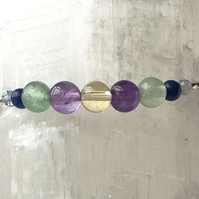 Sagittarius Birthstone Healing Crystal bracelet for Determination & Willpower showing Amethyst, Rainbow Fluorite, Citrine and Sodalite