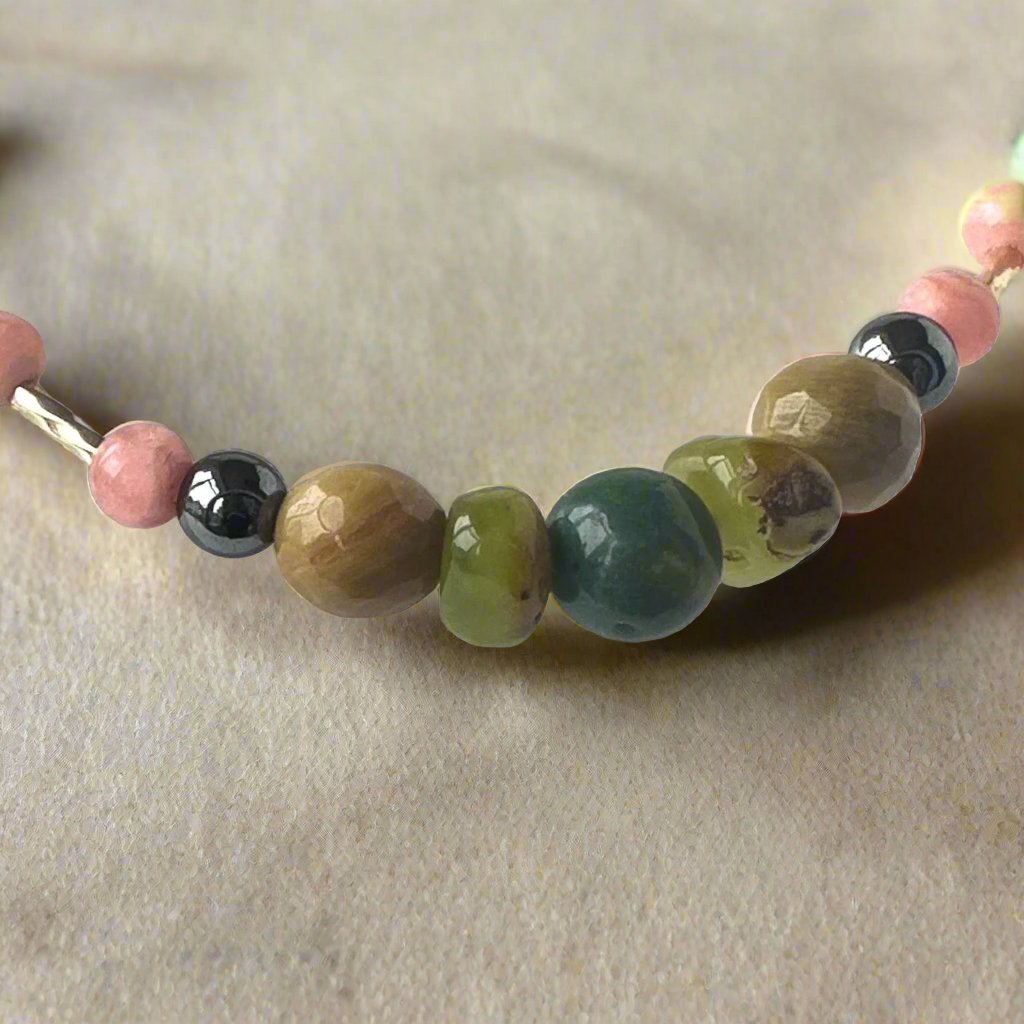 Scorpio birthstone Healing Crystal bracelet for Love and Compassion showing Hematite, Moss Agate, Chrysoprase, Rhodochrosite and Rhodonite