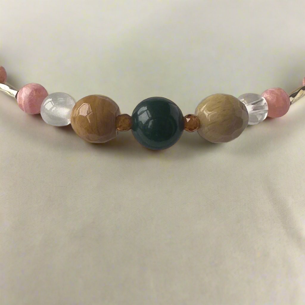 Scorpio Birthstone Healing Crystal bracelet for Love and Compassion showing Moss Agate, Garnet, Rhodochrosite, Rhodonite, Selenite and Clear Quartz