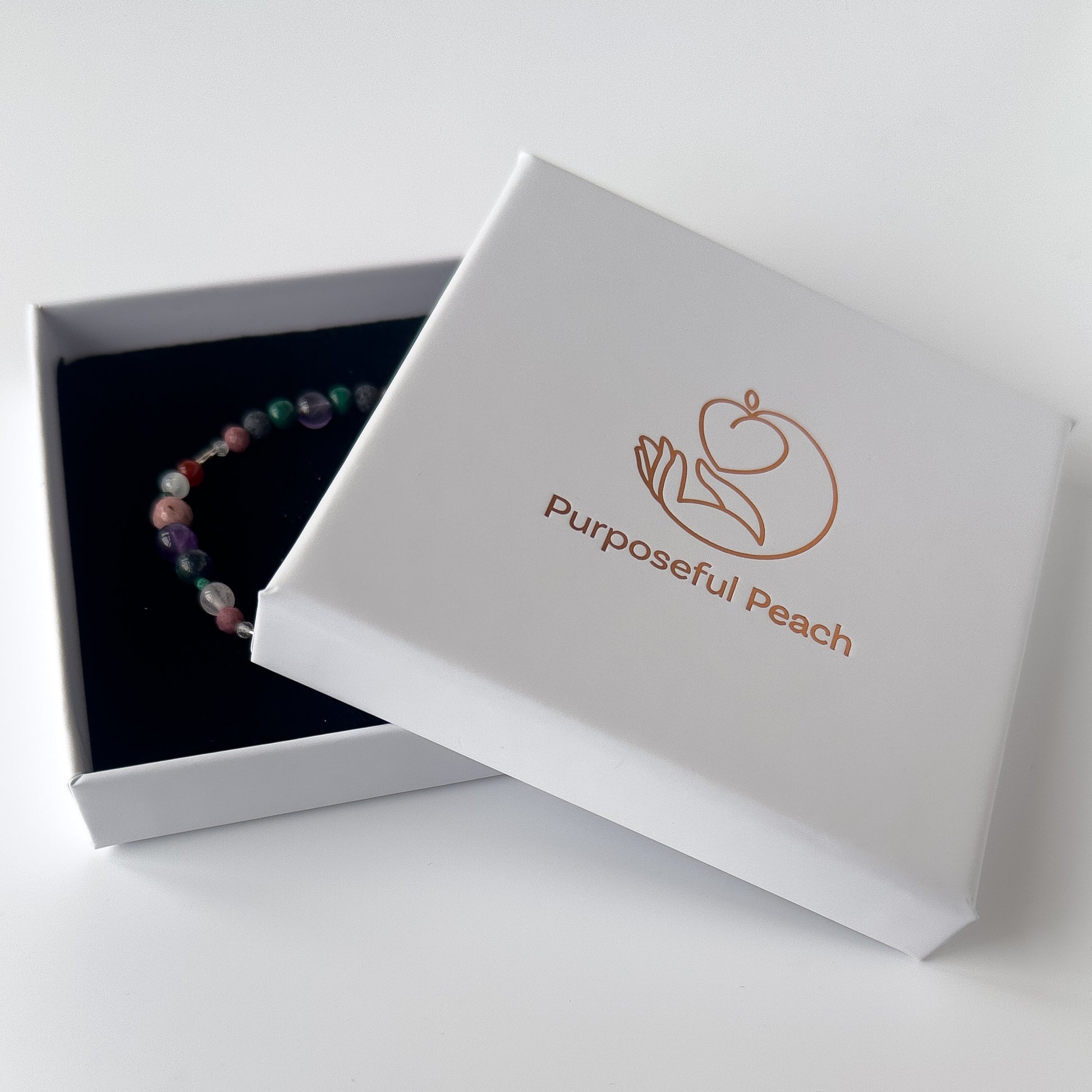 Taurus Crystal Healing bracelet for Grief & Loss in branded Purposeful Peach box