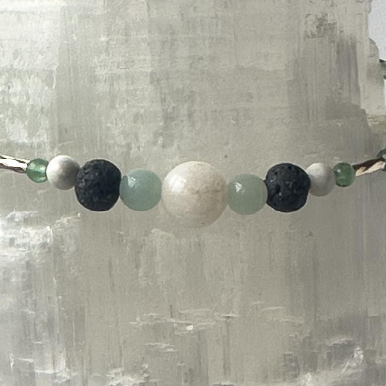 Virgo Birthstone Healing Crystal bracelet for Calm & Anxiety Relief showing Howlite, Moonstone, Green Aventurine, Amazonite, Lava Stone