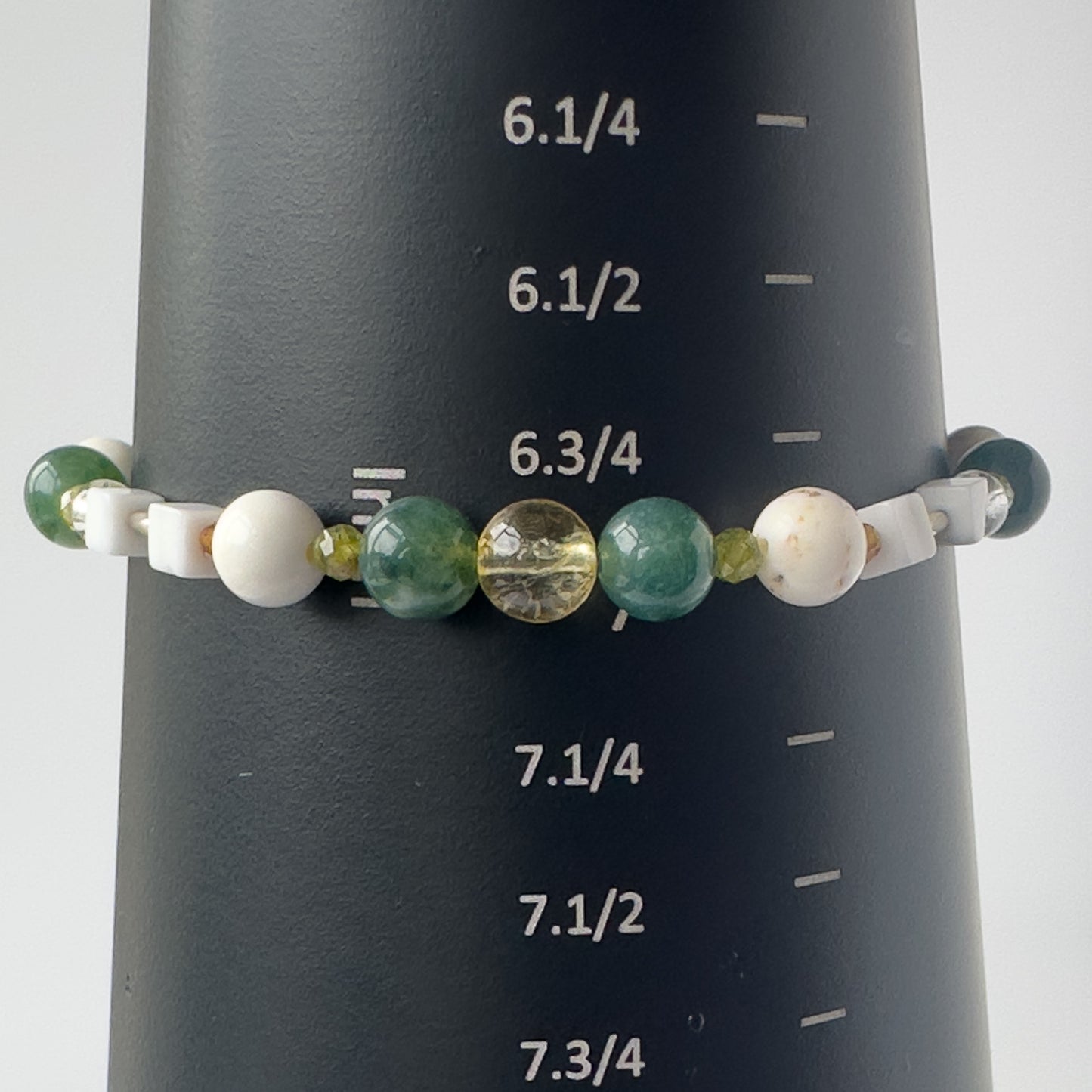 Virgo Birthstone Healing Crystal bracelet for Love and Compassion on mandrel showing size as 7 inches